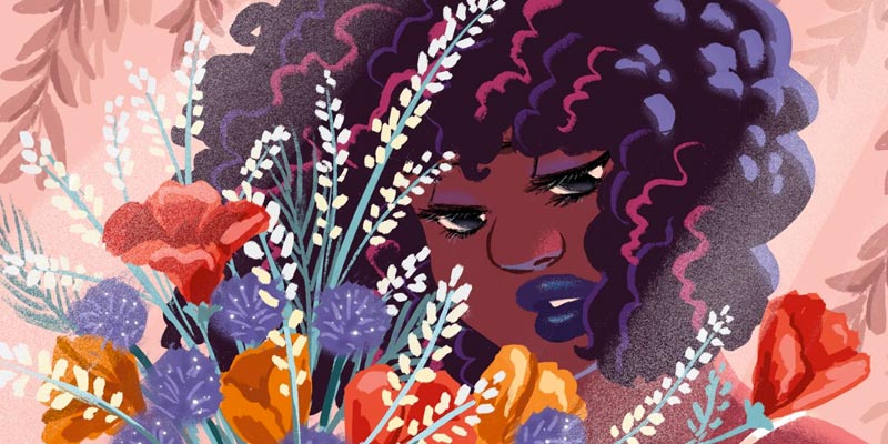 black woman gazing at a bouquet of flowers